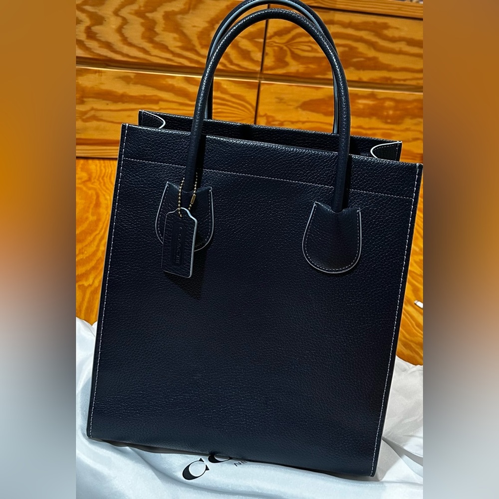 Coach Cashin Carry Tote 29.     ( Used in pristine condition )